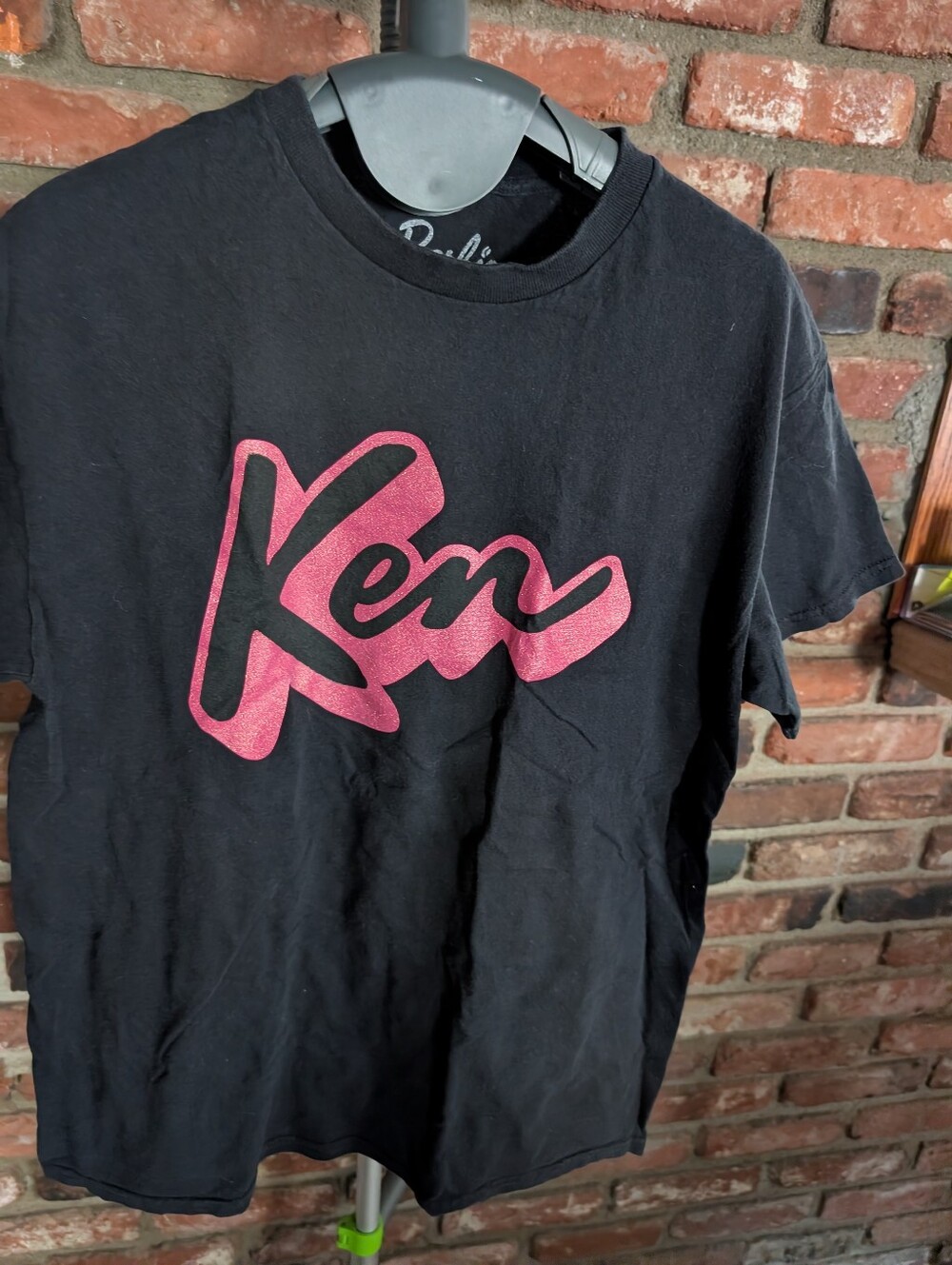 Barbie - Ken Script Logo Tee in Black with Pink Graphic